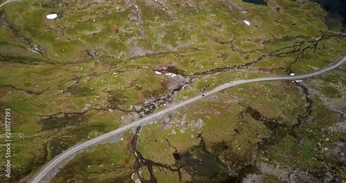 Aerial view of a car driving on a mountain road in the Haukelifjell area in Norway photo