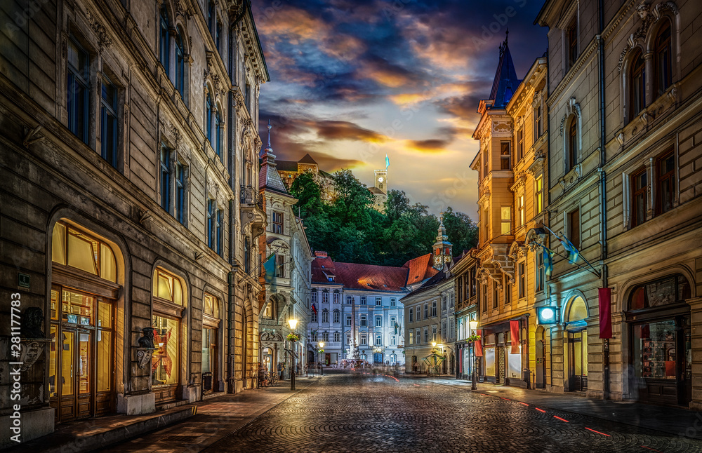 View of the street Stritarjeva, evening city and Ljubljana's castle. Ljubljana, capital of Slovenia.