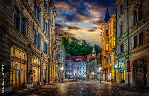 View of the street Stritarjeva, evening city and Ljubljana's castle. Ljubljana, capital of Slovenia.
