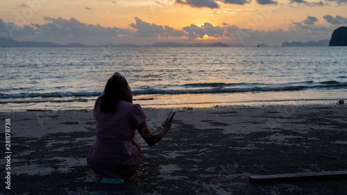 silhouette of a woman at sunset