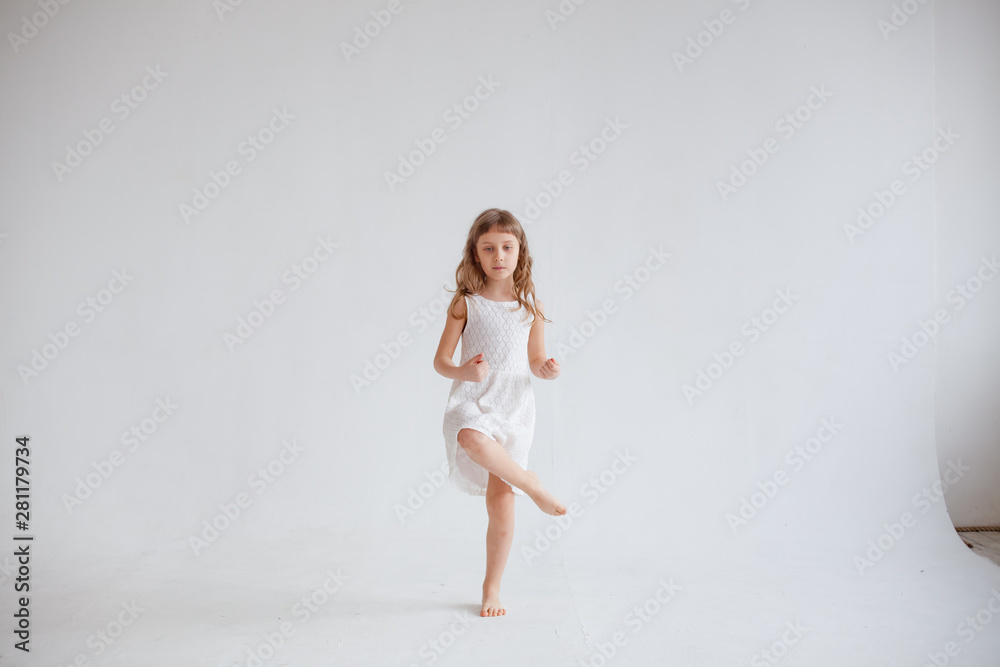 girl in white dress dancing on white background girl in white dress dancing on white background