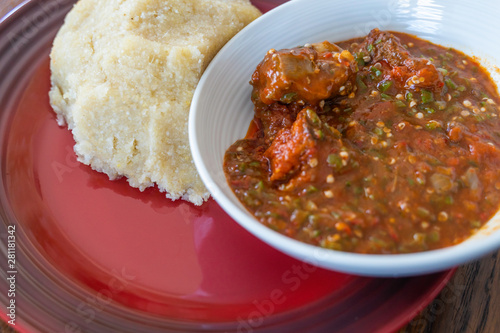 Nigerian Spicy Okro and Pepper stew served with Eba ready to eat