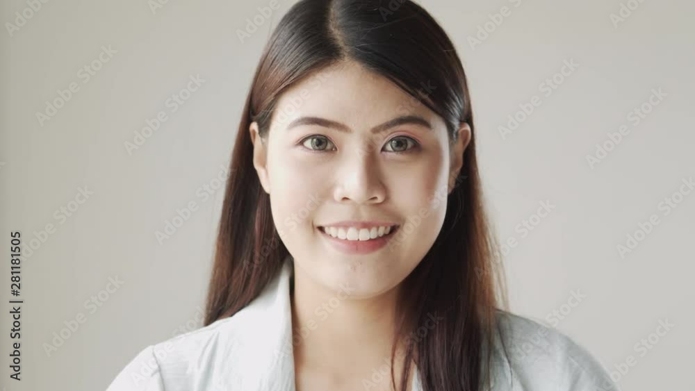 portrait of young beautiful Asian woman smiling and happiness portrait of young beautiful Asian woman smiling and happiness