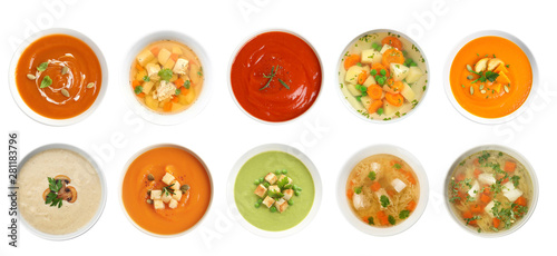 Fresh vegetable detox soup with croutons in dish on white background photo