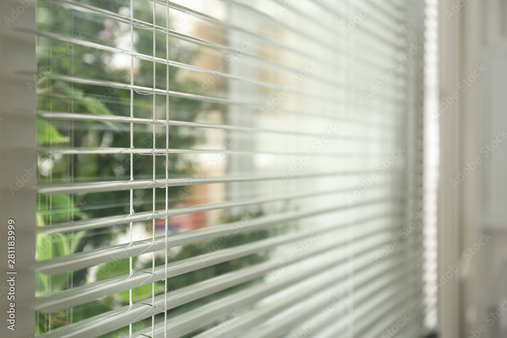 Closeup view of window with clean blinds indoors Closeup view of window with clean blinds indoors