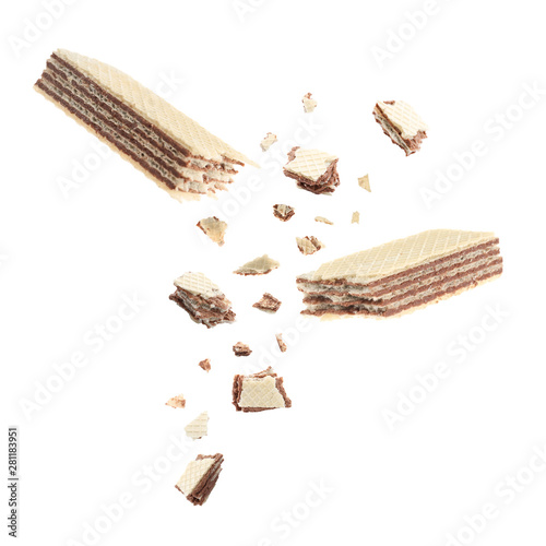 Delicious broken sweet wafer on white background