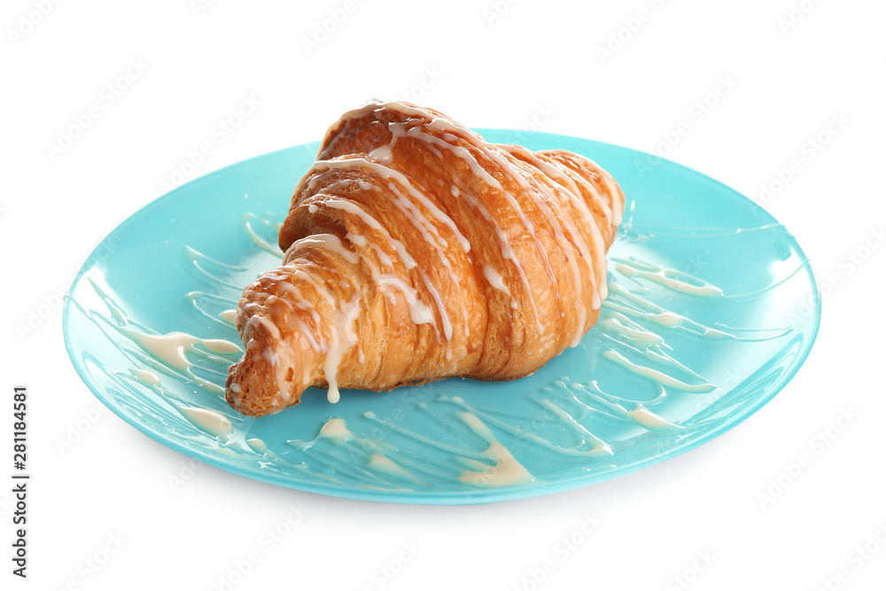 Plate of fresh croissant with condensed milk on white background. French pastry