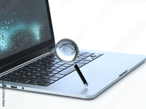 Search,magnifier on the keyboard of a latop, 3d rendering,conceptual image.seo and searching concepts.
