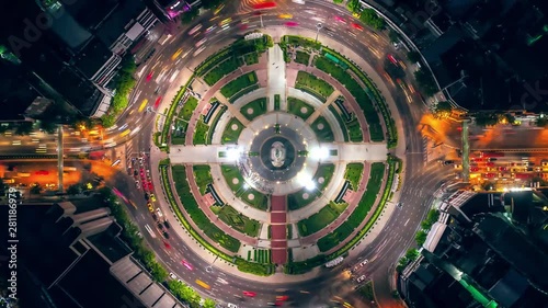 4K Time lapse, aerial top view traffic road roundabout in city at night, Time lapse top road in bangkok. photo