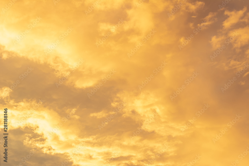 cumulus, cirrus, clouds on pale pink and gold sky with glow, shine, light up, natural background