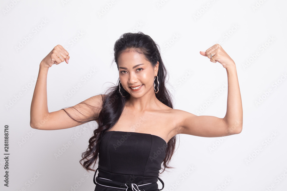 Beautiful young Asian woman flex bicep. Beautiful young Asian woman flex bicep.