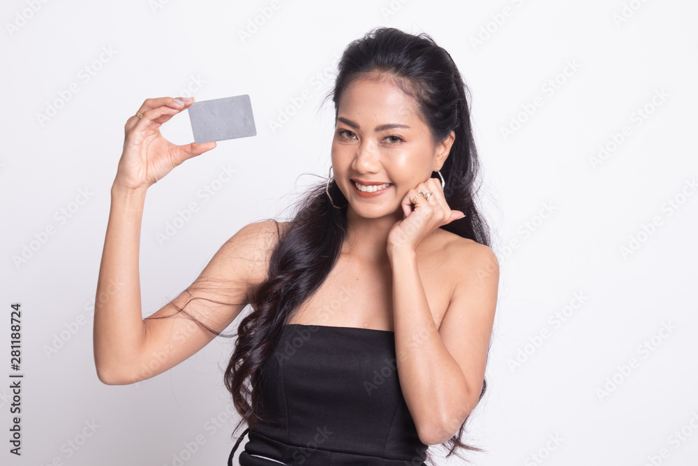 Happy young Asian woman with a blank card. Happy young Asian woman with a blank card.