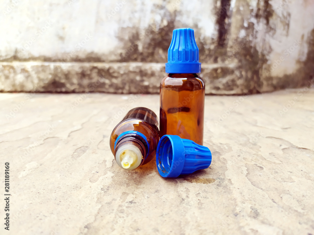 brown glass medicine bottle put on the road brown glass medicine bottle put on the road