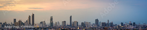 Panorama High rise office building The city centre of Bangkok. At dawn, the light from the sky is orange. © Ake
