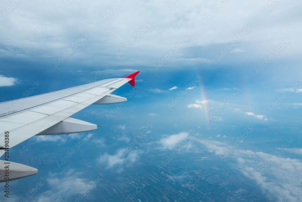 Fototapeta premium high view image through airplane window with nice clear blue sky