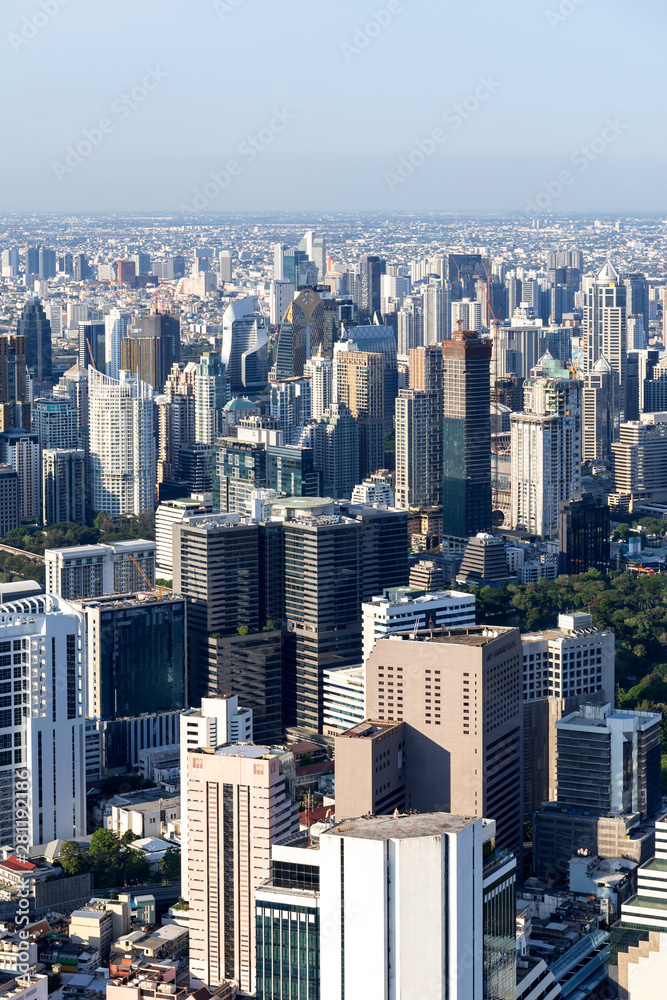 Fototapeta premium The Metropolitan Bangkok City - Aerial view urban tower Bangkok city Thailand on April 2019 , blue sky background , Cityscape Thailand