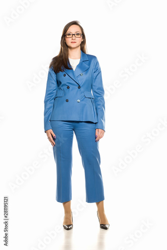 Young business woman standing on white background