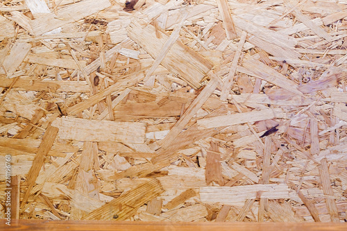 Background pressed plywood particleboard from sawdust of different sizes