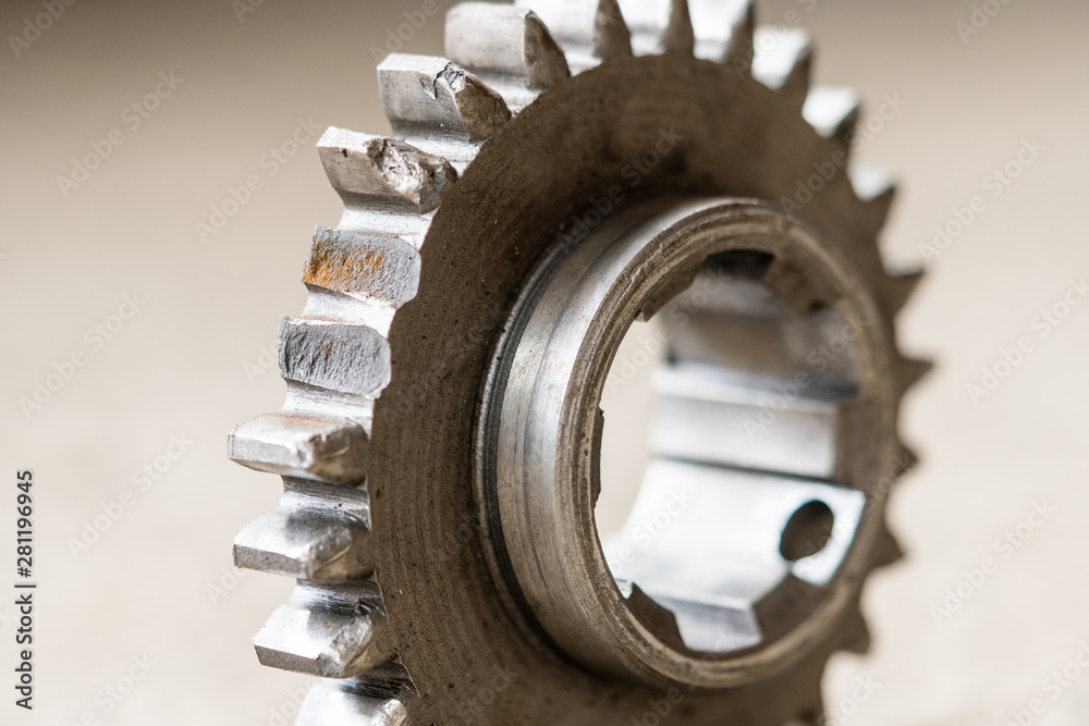 Closeup view on broken teeth on the gear. Mechanical workshop and repair concept. Closeup view on broken teeth on the gear. Mechanical workshop and repair concept.