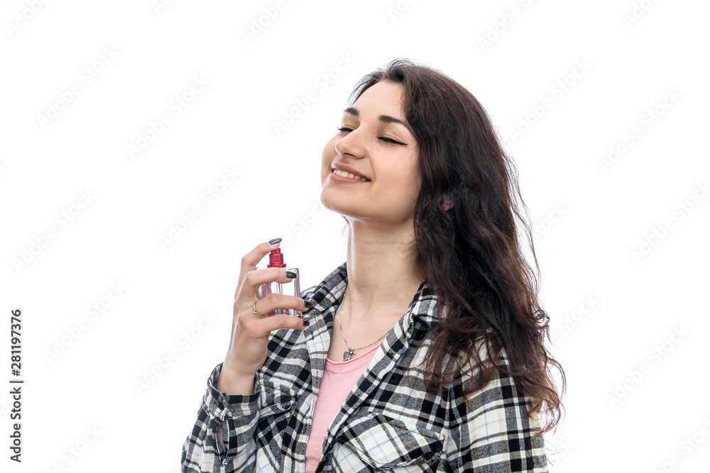 Woman with perfume bottle isolated on white Woman with perfume bottle isolated on white