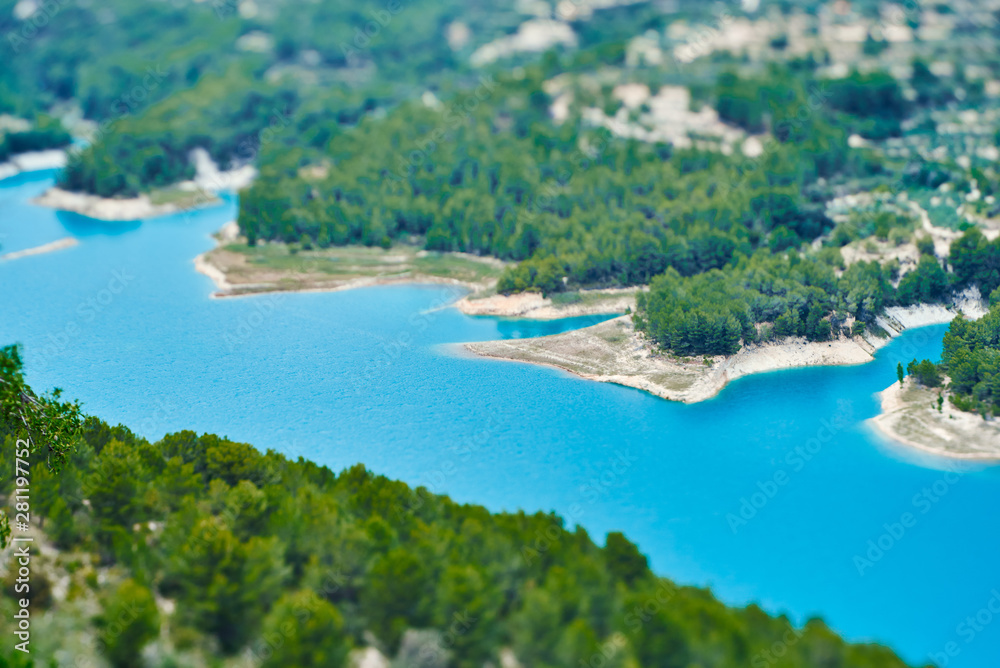 Fototapeta premium Beautiful view of the blue water reservoir, mountains and river near the castle of Guadalest .