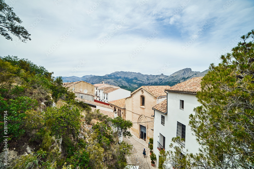 Beautiful view on old buildings and mountains from a castle in Guadalest.