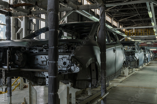 Car body on the production line. Car production. Modern technologies at the plant
