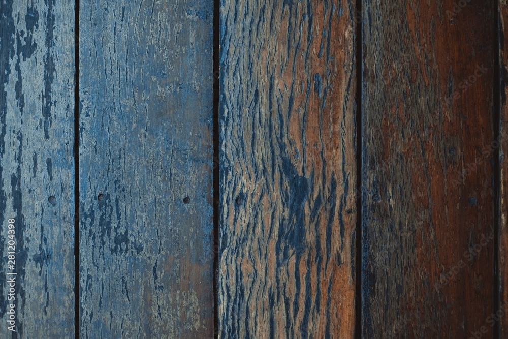 Naklejka premium Dark brown wood texture with natural striped pattern background