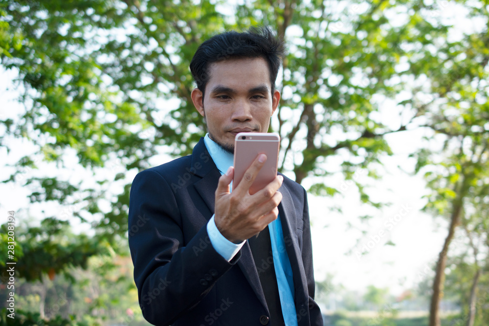 Businessman People holding Mobile Smart Phone and Talking phone Businessman People holding Mobile Smart Phone and Talking phone