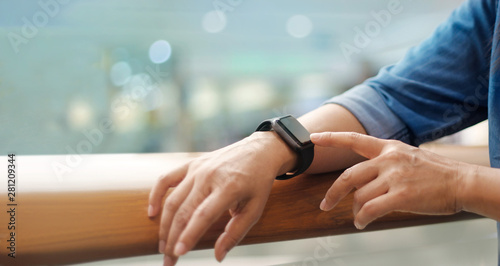 A man using his smart watch app, communication,  innovation and technology, business and network connection.