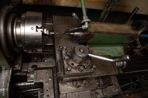 Machining on a lathe  internal boring of a part with a tool.