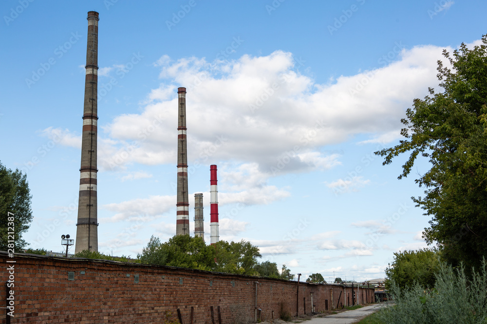 factory chimneys on background of blue sky factory chimneys on background of blue sky