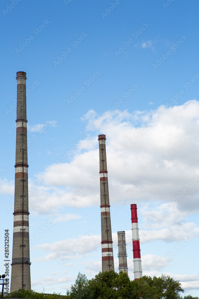 factory chimneys on background of blue sky factory chimneys on background of blue sky
