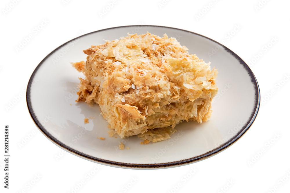 Napoleon cake on plate isolated on white Napoleon cake on plate isolated on white