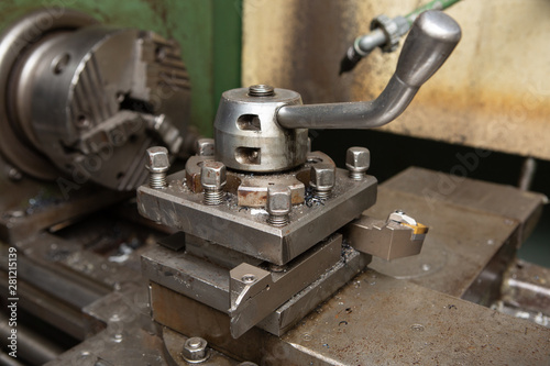 Machining on a lathe, internal boring of a part with a tool.