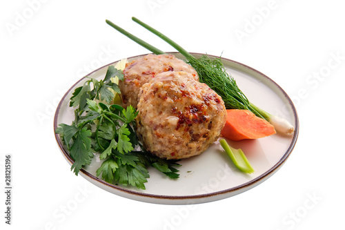 Meatballs served with fresh carrot, spring onion and parsey photo
