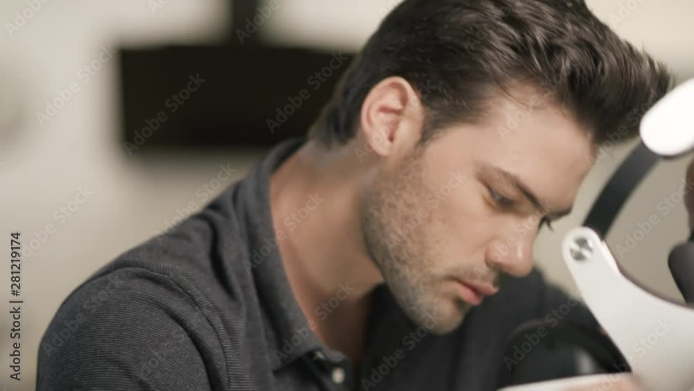 Young man putting video glasses. Portrait of man in virtual glasses moving arms. Young man putting video glasses. Portrait of man in virtual glasses moving arms.