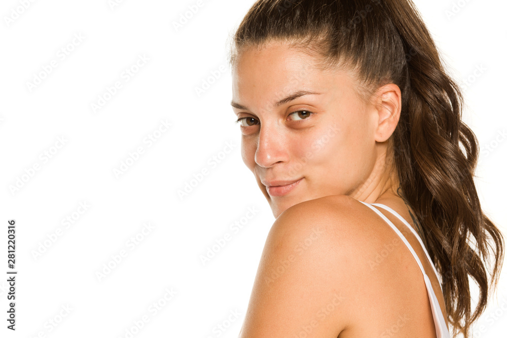 Young smiling woman without makeup on white background Young smiling woman without makeup on white background