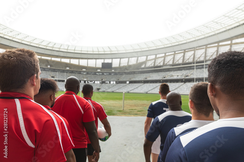 Rugby teams standing in a row at the entrance of stadium for match