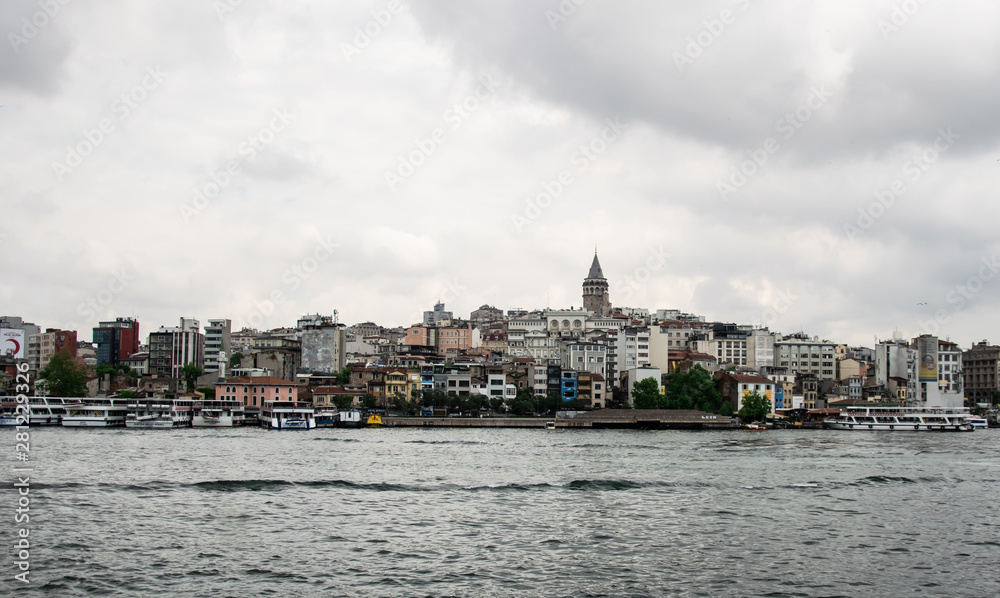 Galata Tower rise above the city, Istanbul, Turkey. It is an attraction of Istanbul. Beautiful panoramic view of the old district of Istanbul