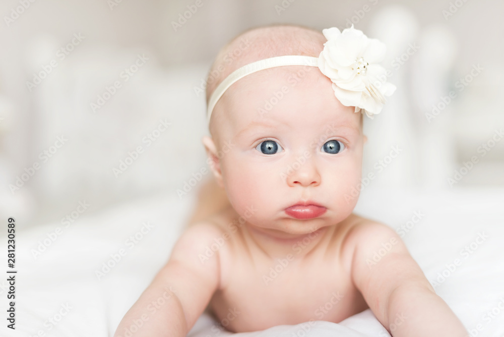 Beautiful newborn baby girl with blue eyes. Beautiful newborn baby girl with blue eyes.