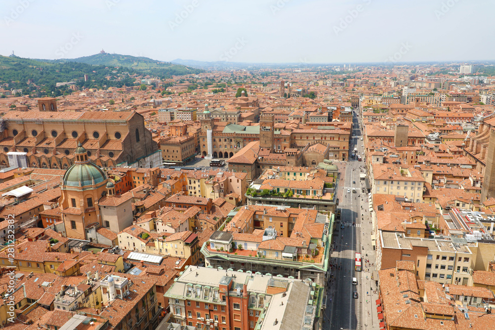 Bologna aerial cityscape of old town from the tower with Rizzoli street foreground, italian medieval landscape