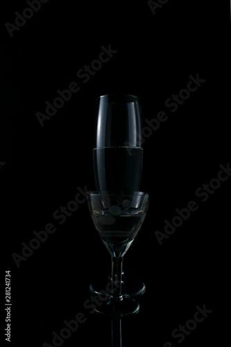 Insulated glass with liquid on black background