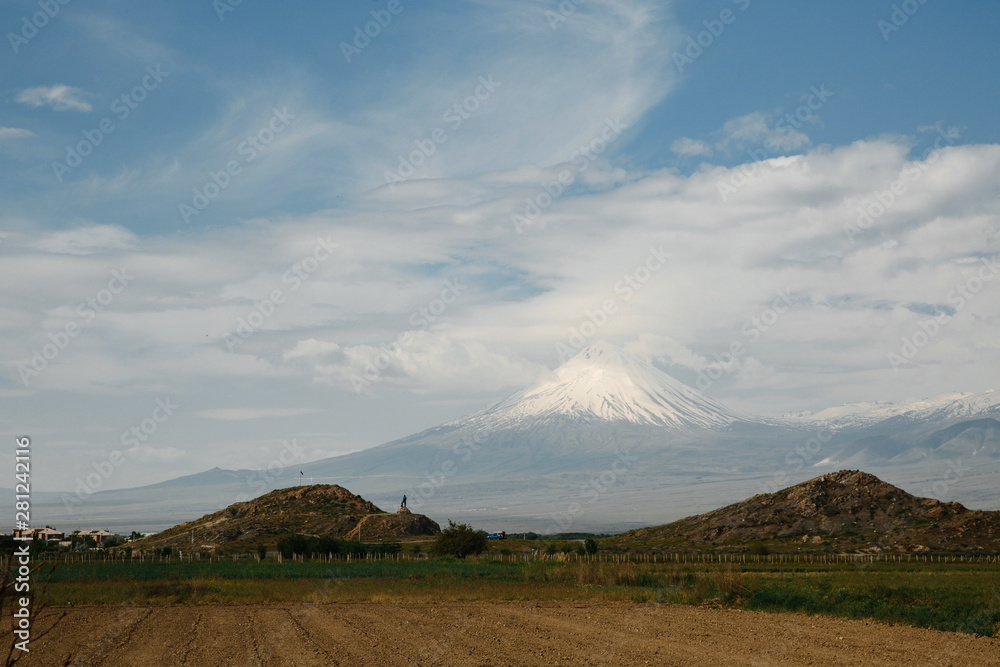 Obraz premium Kevork Chavush monument on the background of Mount Ararat in Lusarat , Armenia.