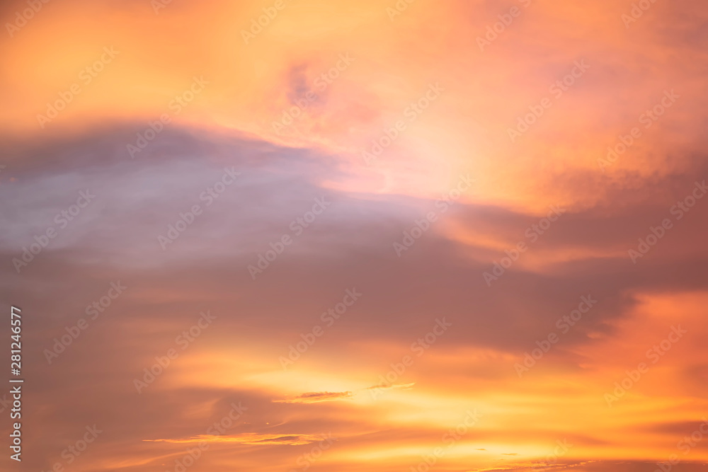 Landscape of the dramatic sunset on the sky with golden clouds in the evening. Colorful on the sky in twilight with clouds.