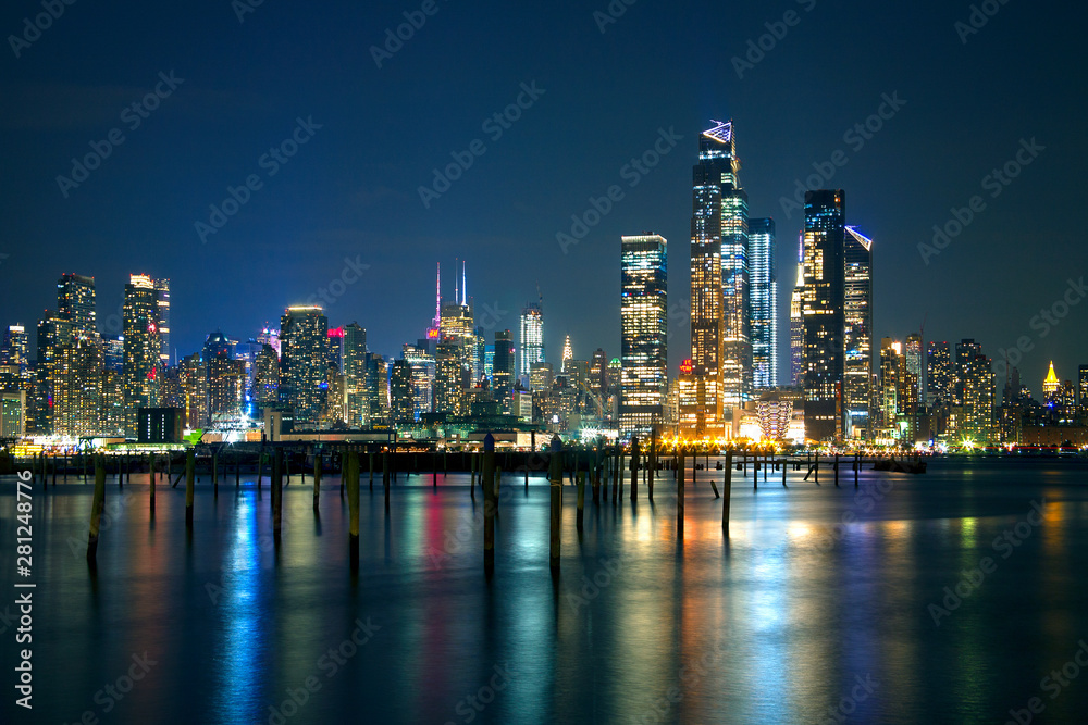 Manhattan night lights reflected in Hudson Manhattan night lights reflected in Hudson