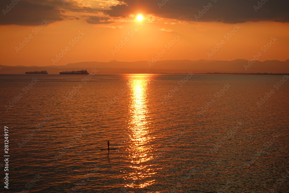 Obraz premium Beautiful sunset with clouds over the Aegean sea