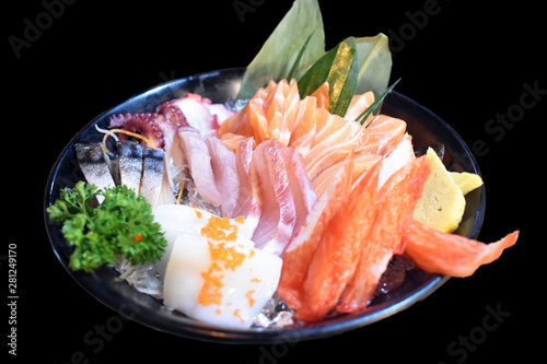 mixed sashimi seafoods on black background, Japanese food