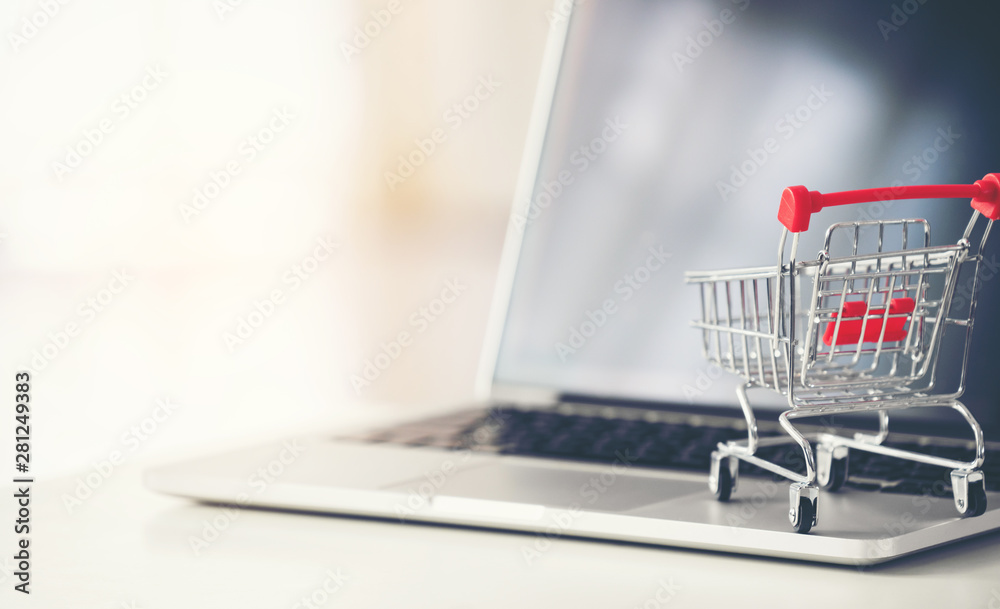 shopping cart with laptop on the desk