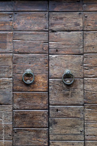 Detail of historic massive wooden door.